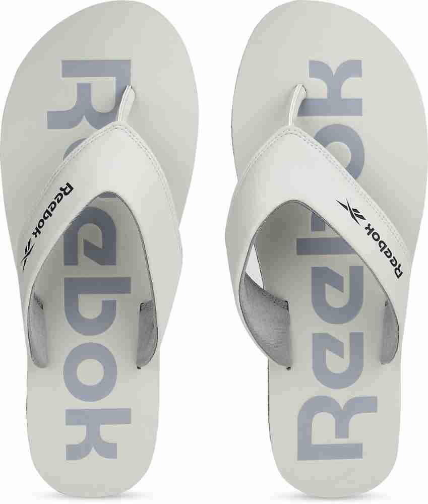 Reebok slippers online store