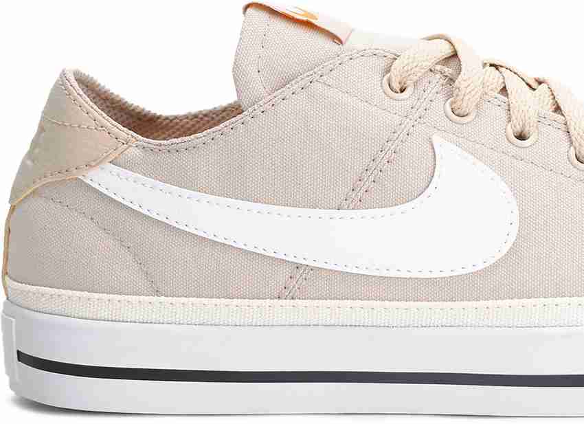 Nike white shop canvas shoes womens
