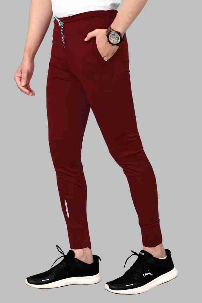 DELIZIA Solid Men Maroon Track Pants Buy DELIZIA Solid Men