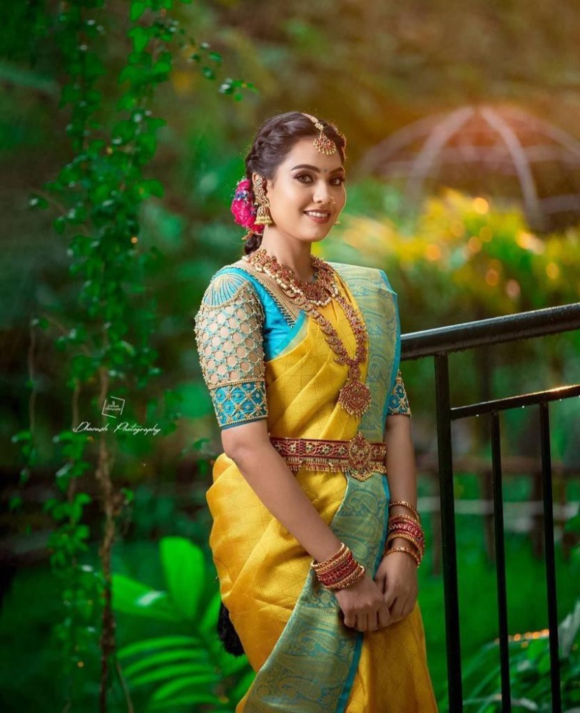 Aggregate 74+ kanjeevaram yellow bridal saree latest