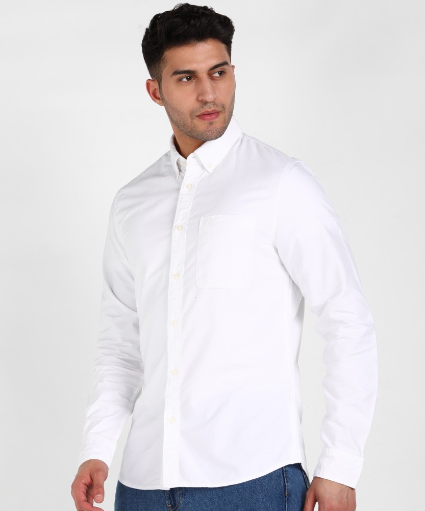 Calvin Klein Jeans Men Solid Casual White Shirt - Buy Calvin Klein Jeans  Men Solid Casual White Shirt Online at Best Prices in India