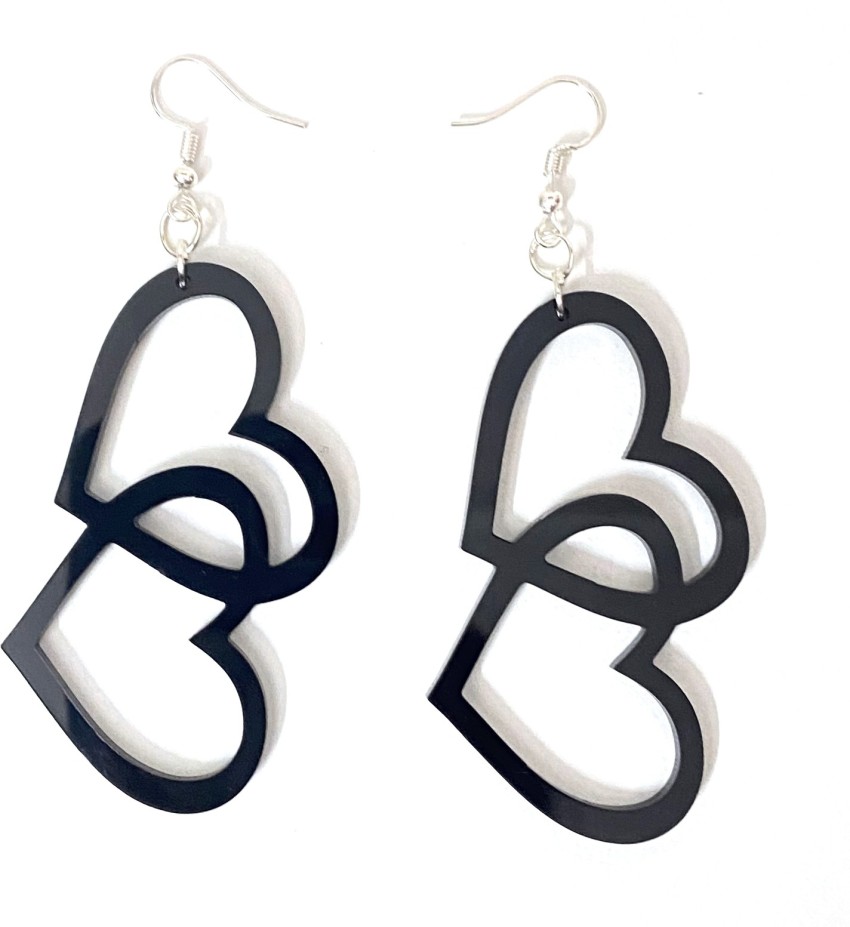 An onear photo of our laser cut acrylic earrings  rlasercutting