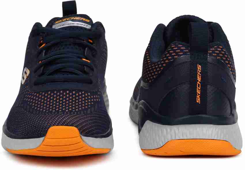 Skechers running homme orange hotsell