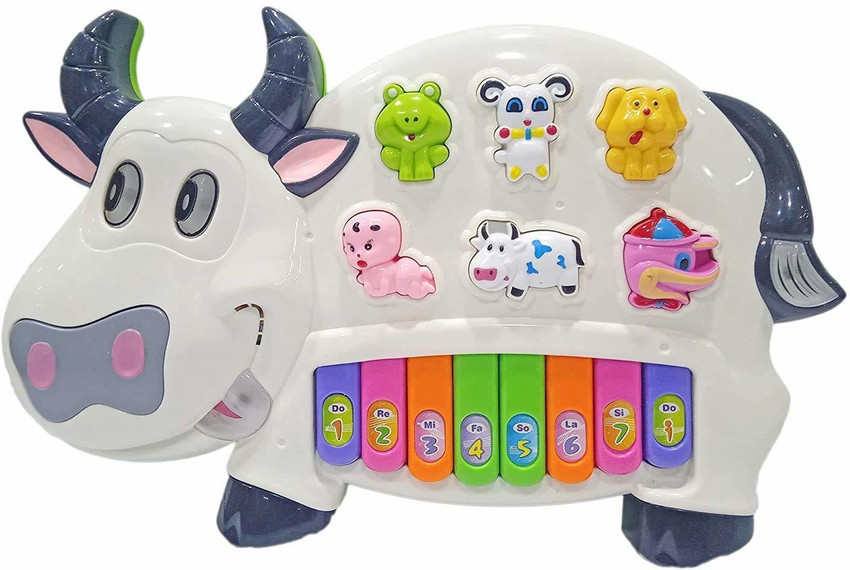 Cow piano toy top