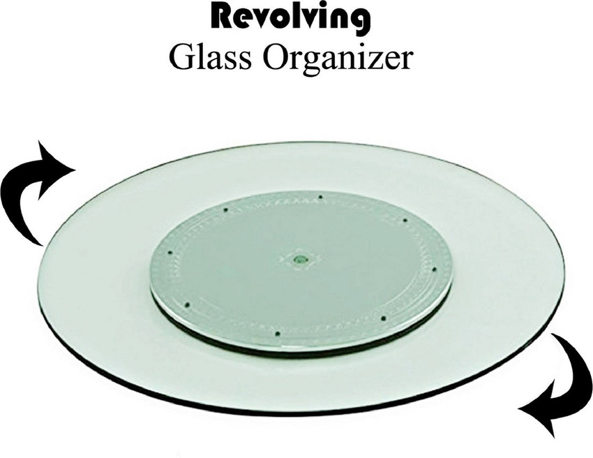 Rotating dining table outlet tray