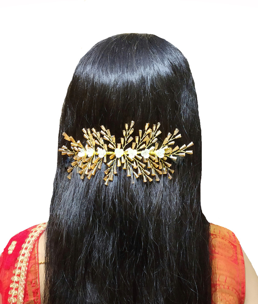 Gold hair store brooch