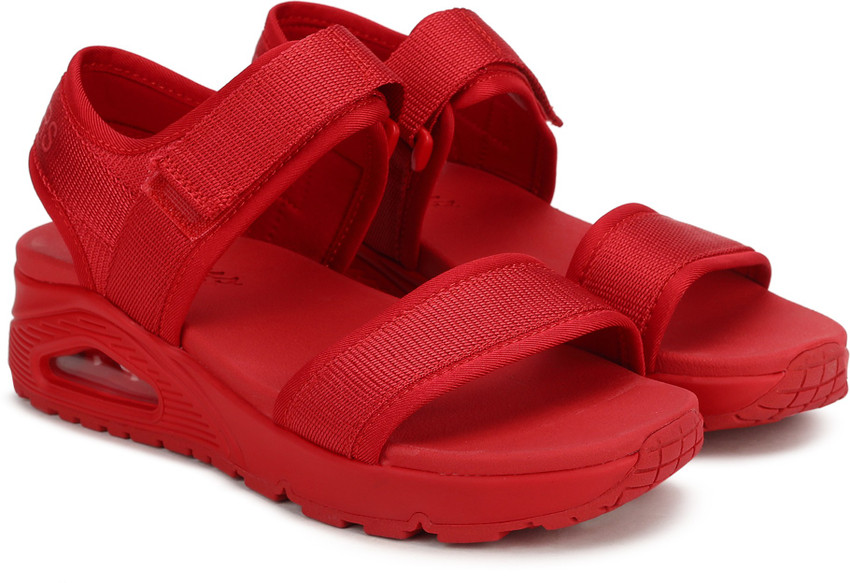 red sketcher sandals