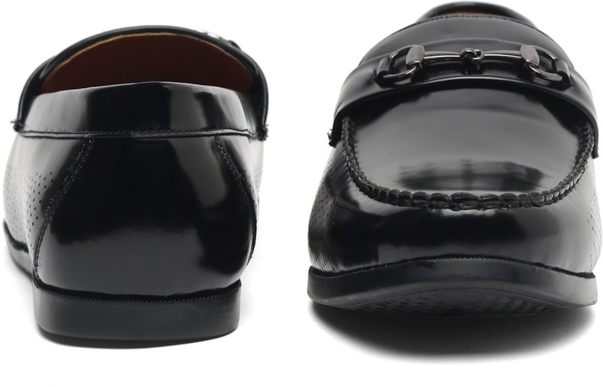 Shining black store loafer shoes