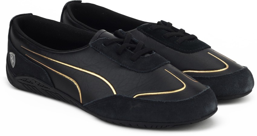 Puma ferrari best sale shoes gold men