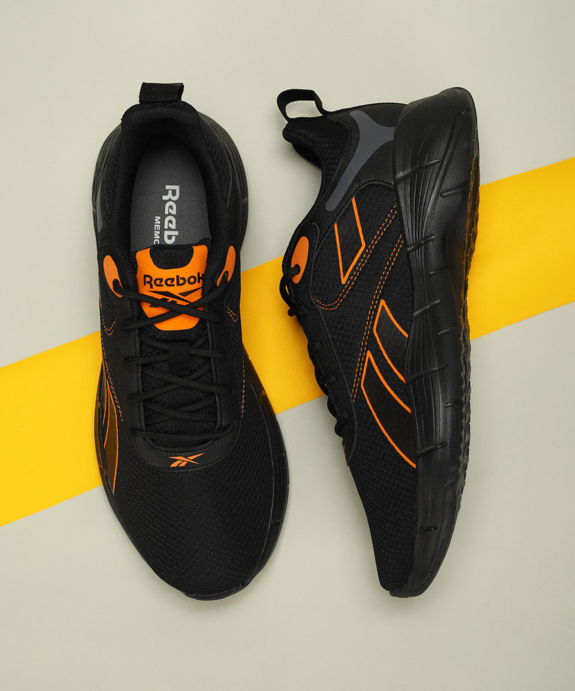 black and orange reebok shoes