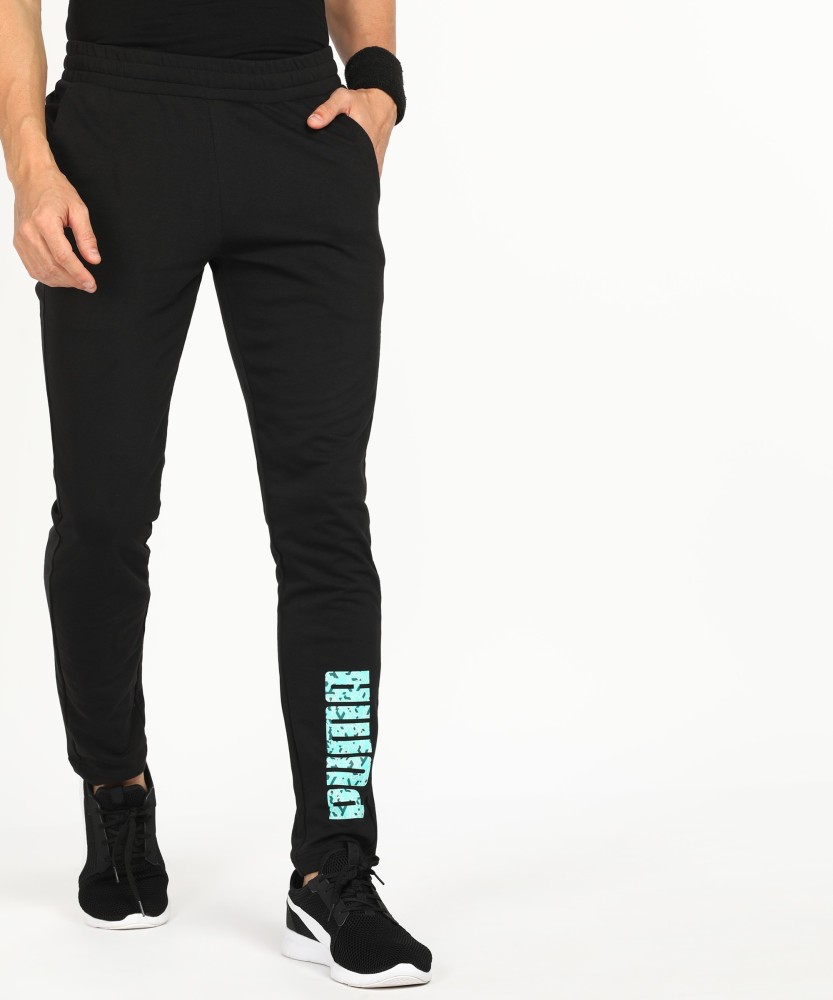 PUMA MENS GRAPHIC PANTS 5 Solid Men Black Track Pants - Buy PUMA MENS  GRAPHIC PANTS 5 Solid Men Black Track Pants Online at Best Prices in India