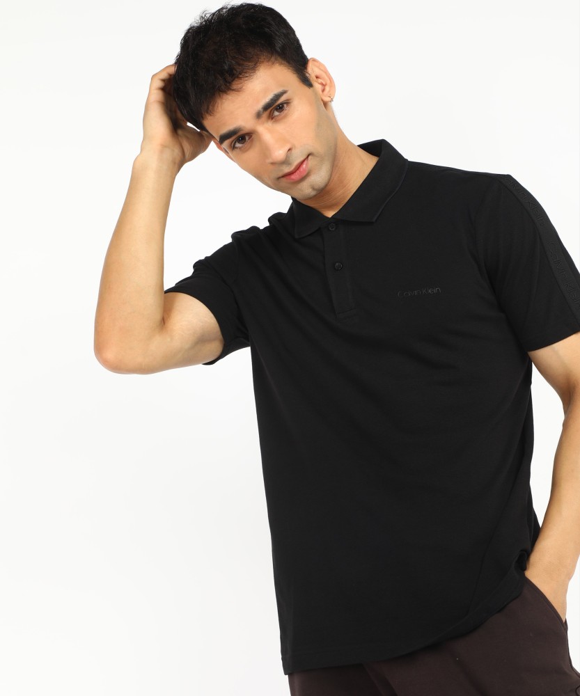 Calvin Klein Jeans Solid Men Polo Neck Black T-Shirt - Buy Calvin Klein  Jeans Solid Men Polo Neck Black T-Shirt Online at Best Prices in India