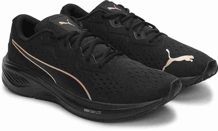 Rose gold and store black puma shoes