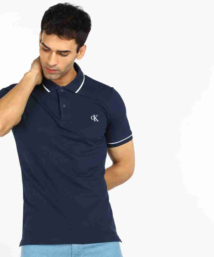 Calvin Klein Jeans Solid Men Polo Neck Blue T Shirt Buy Calvin Klein Jeans Solid Men Polo Neck Blue T Shirt Online at Best Prices in India Flipkart