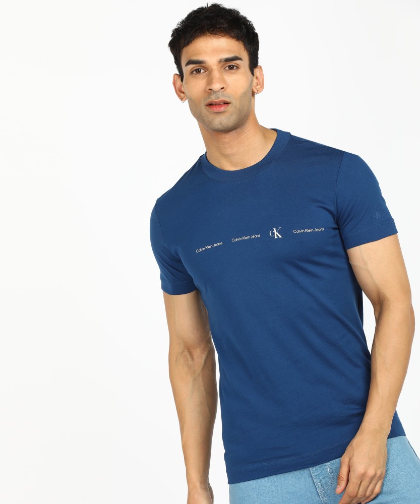 Jeans Solid Men Round Neck Blue T-Shirt - Buy Calvin Klein Jeans Solid Men Round Neck Blue T-Shirt Online at Best Prices in India | Flipkart.com