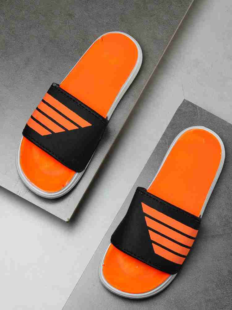 Orange and hotsell black adidas slides