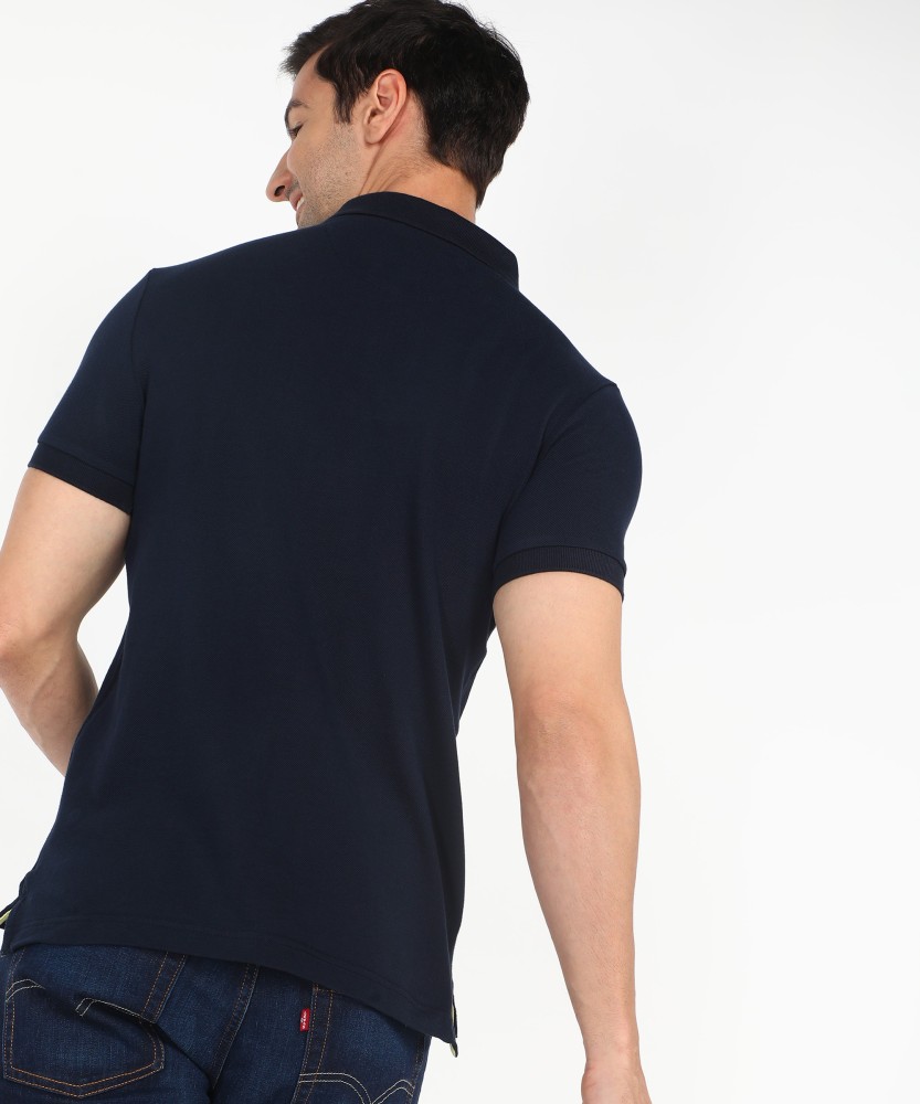 Buy Men Blue Solid Polo Neck T-shirt Online - 707619