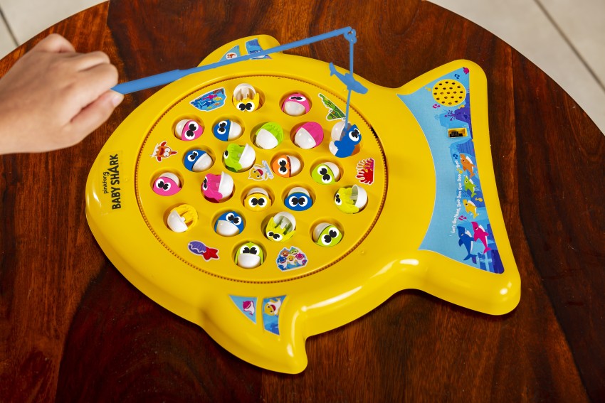 This baby shark themed fishing game plays the cursed song on a loop. I just  opened the circuitry and disabled the speaker. Feel like a hero. : r/daddit