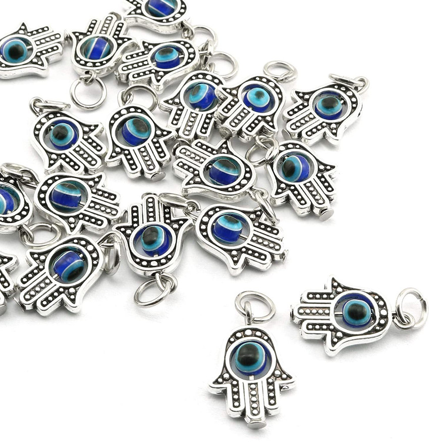 Hand with eye deals charm