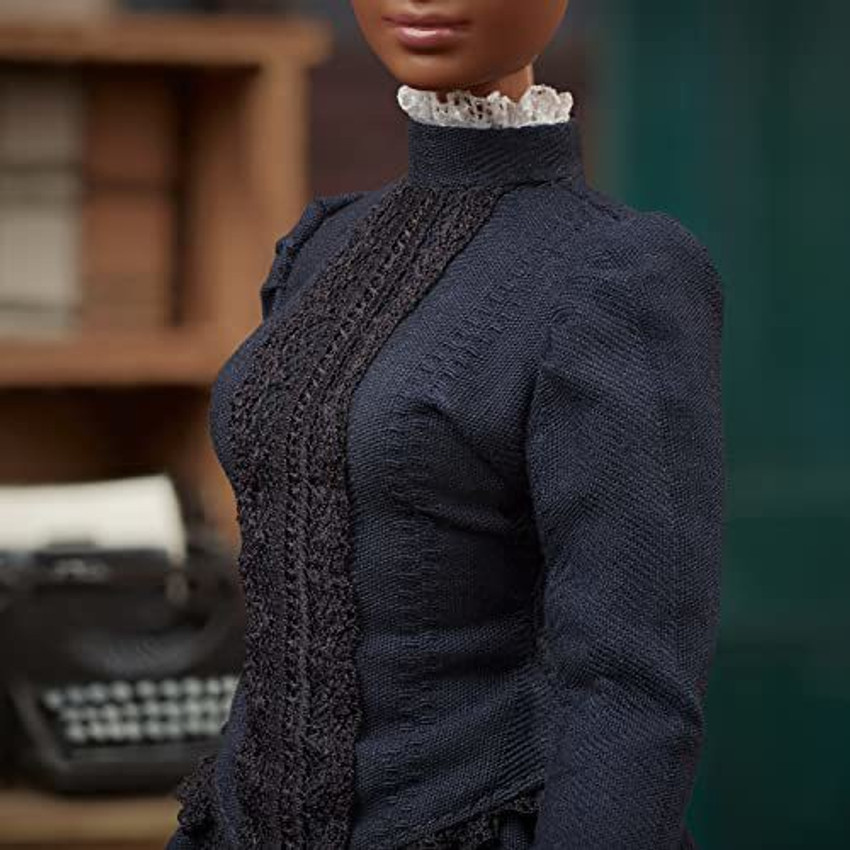 BARBIE Inspiring Women Doll Wearing Blue Dress with Newspaper