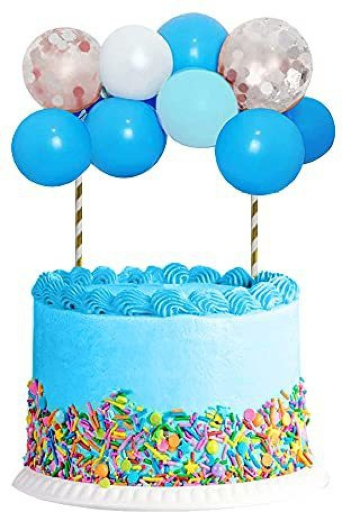 Blue happy birthday cake with candles and decorations