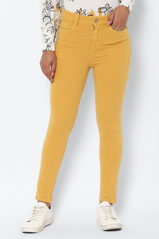 Mustard colored shop jeans for ladies