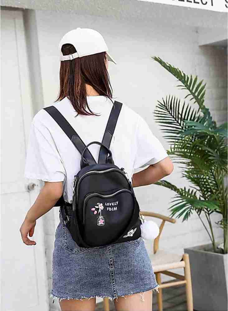 Black top embroidered backpack