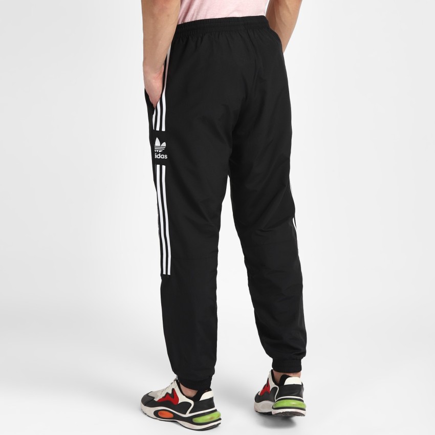 adidas Originals adicolor Firebird three stripe joggers in black | ASOS
