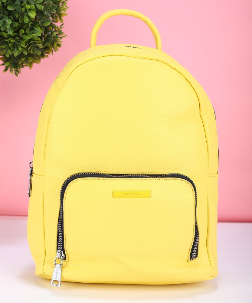 Yellow best sale purse backpack