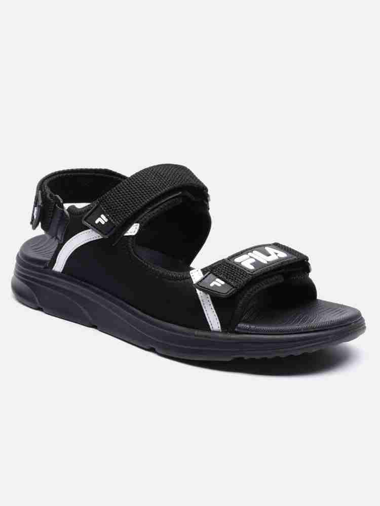 Fila sandals deals black and gold