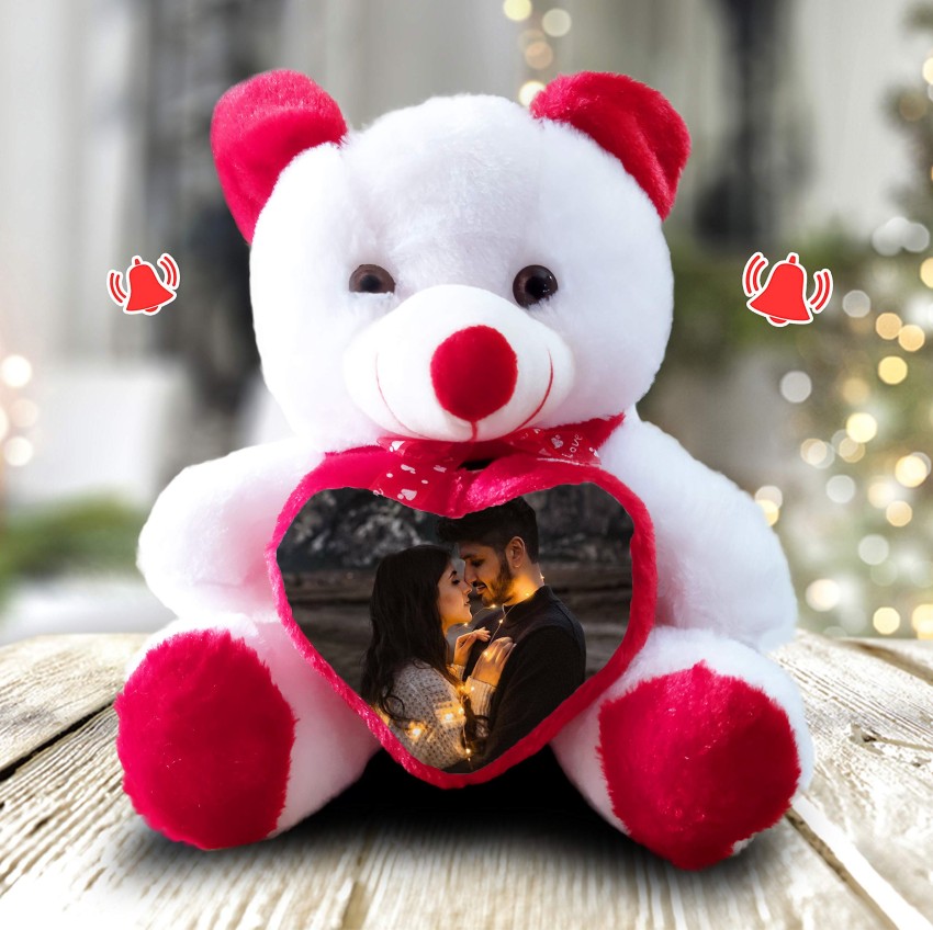 Lovely red teddy bear with red heart on white background Stock Photo - Alamy
