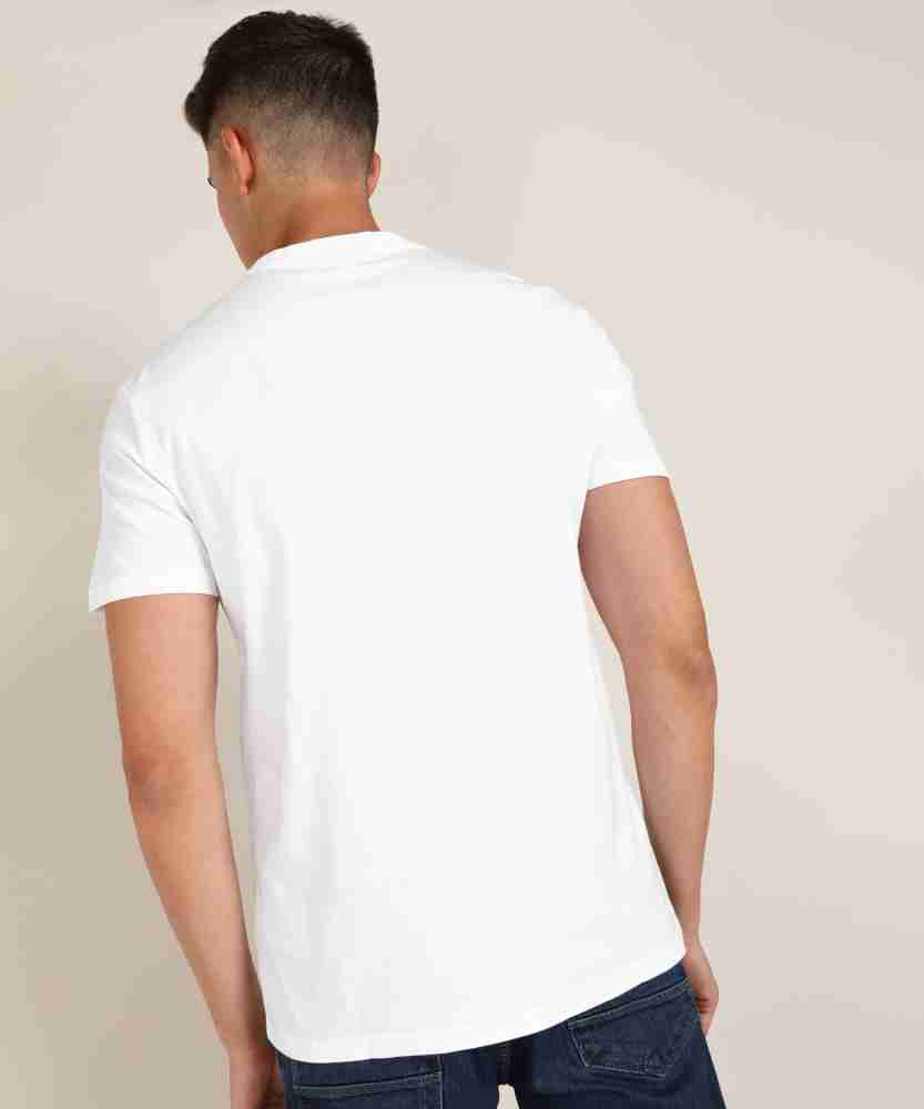 Calvin Klein Jeans Graphic Print Men Round Neck White T-Shirt - Buy Calvin  Klein Jeans Graphic Print Men Round Neck White T-Shirt Online at Best  Prices in India