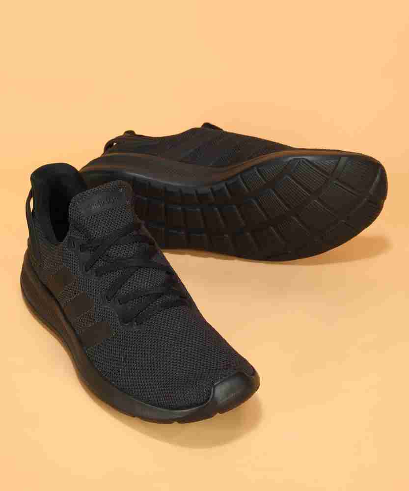 Pure black best sale running shoes