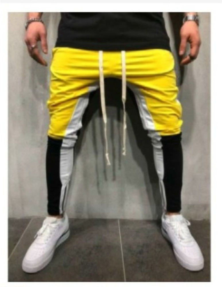 Yellow and white track pants top