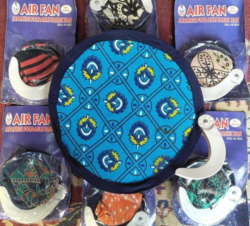 Fabric hand fans store