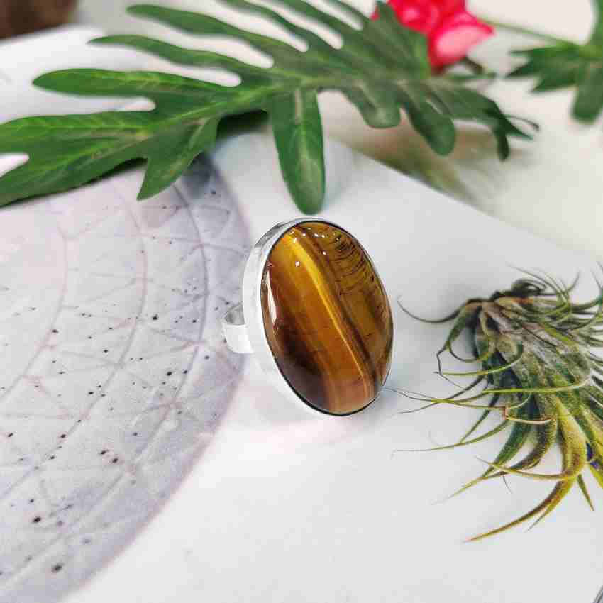 Shubhanjali Tiger Eye Natural Oval Shape Crystal Adjustable Stone Finger Ring Jewellery Stone Ring Price in India Buy Shubhanjali Tiger Eye Natural Oval Shape Crystal Adjustable Stone Finger Ring Jewe...