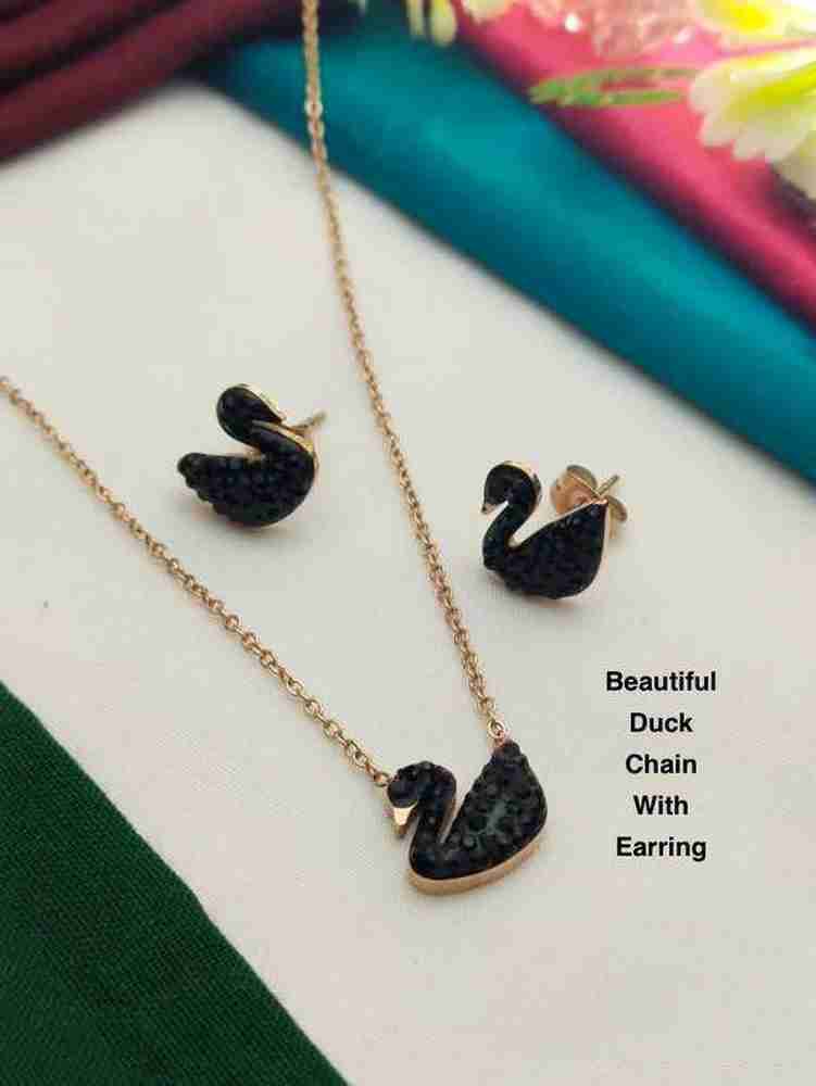 Swan necklace with store matching earrings