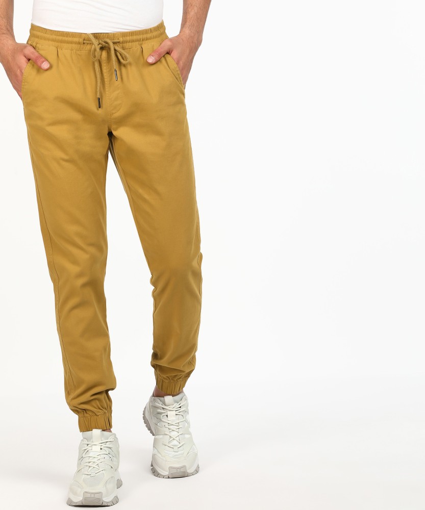 Van Heusen Formal Trousers  Buy Van Heusen Men Cream Solid Regular Fit  Trousers Online  Nykaa Fashion