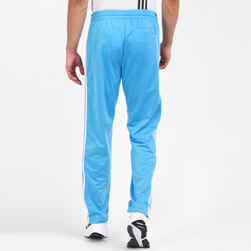adidas originals three stripe track pants in blue