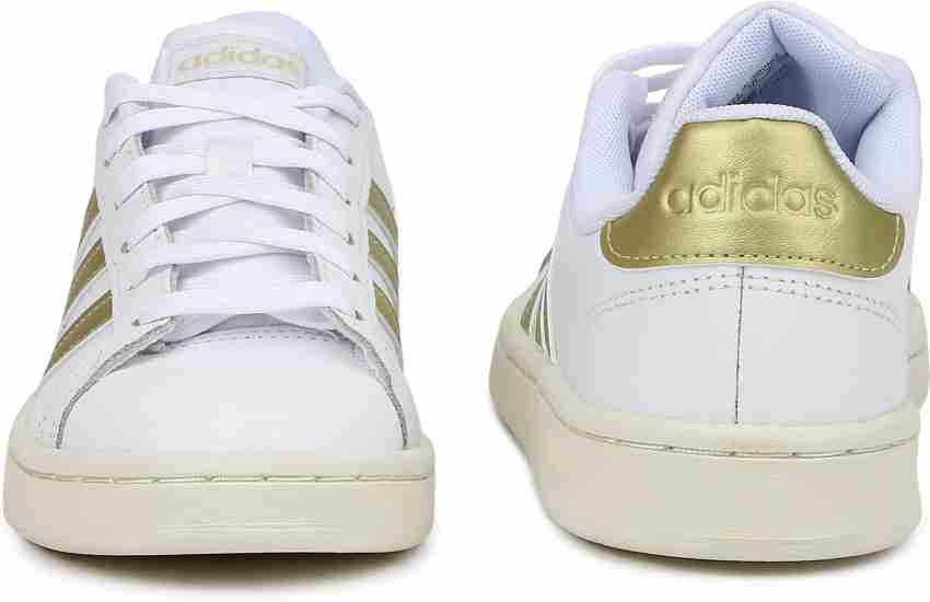 Adidas gold stripe outlet shoes