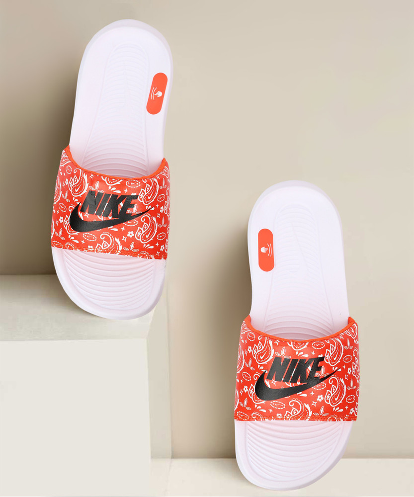 Nike benassi hot sale slides orange