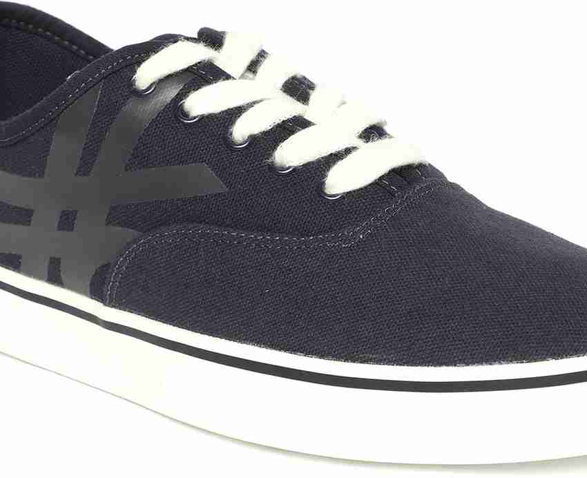 Ucb black casual shoes on sale