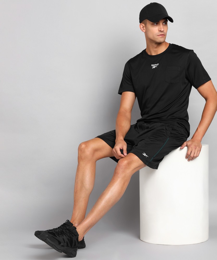 REEBOK Solid Men Round Neck Black T Shirt Buy REEBOK Solid Men Round Neck Black T Shirt Online at Best Prices in India Flipkart