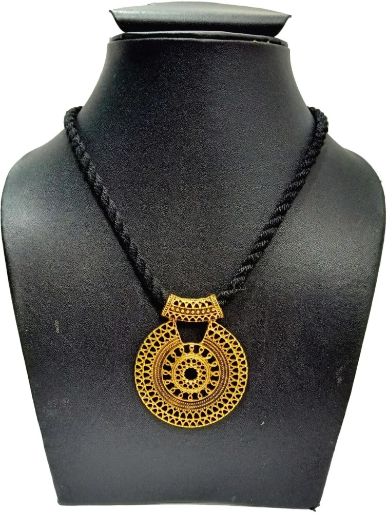 Gold pendant with hot sale black thread