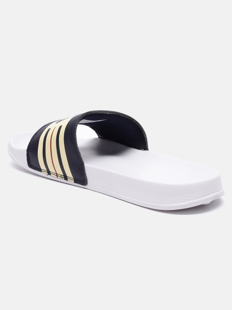 White and gold hot sale fila slides