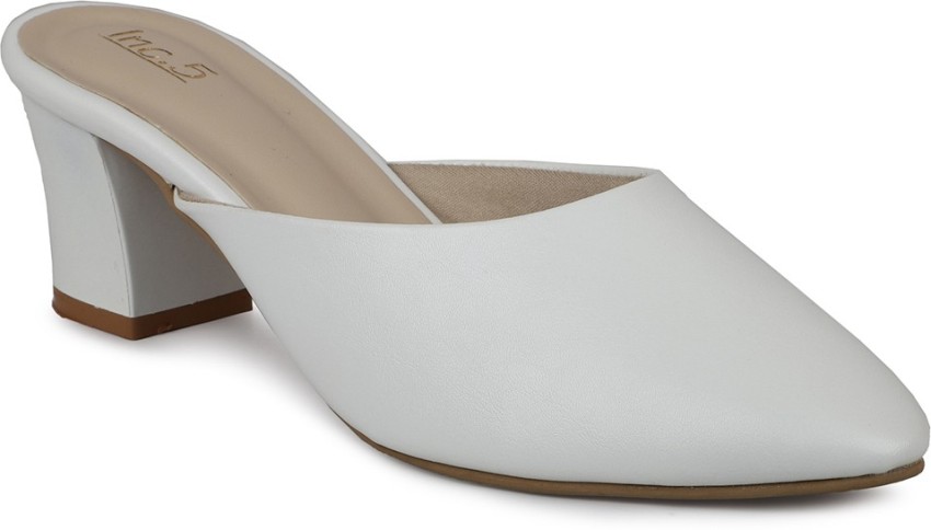 Heeled mules online white