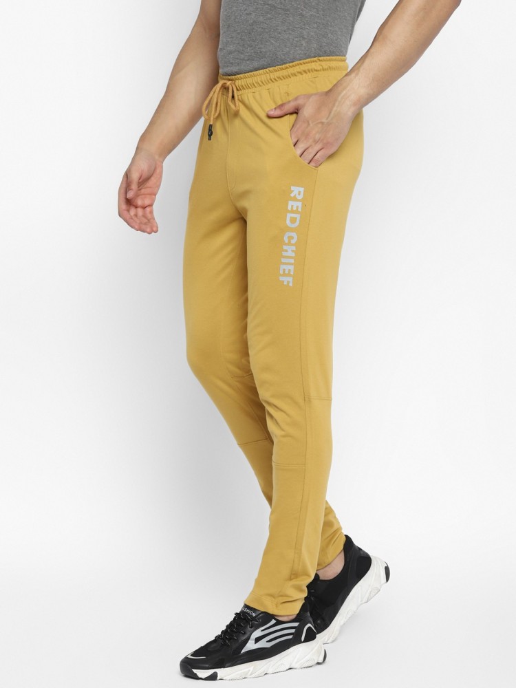 Red and yellow track clearance pants