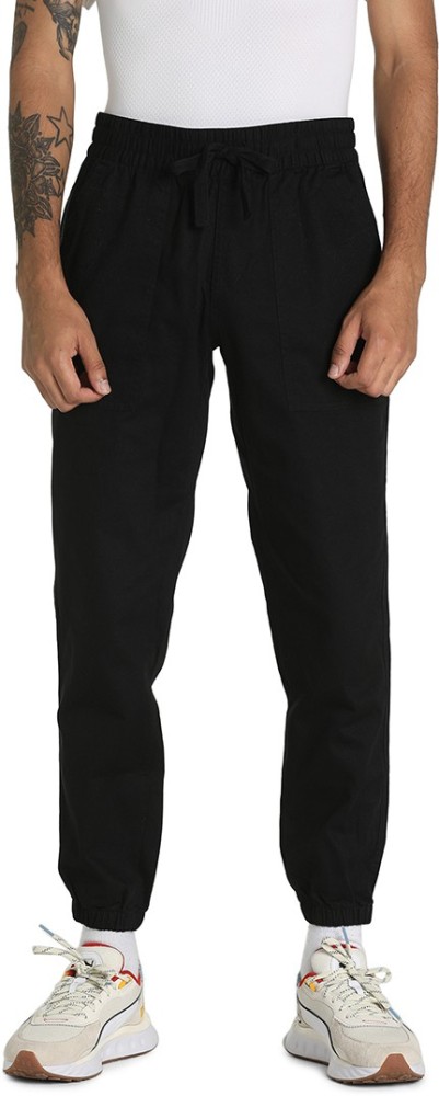 PUMA Downtown Twill Pants cl Solid Men Black Track Pants - Buy