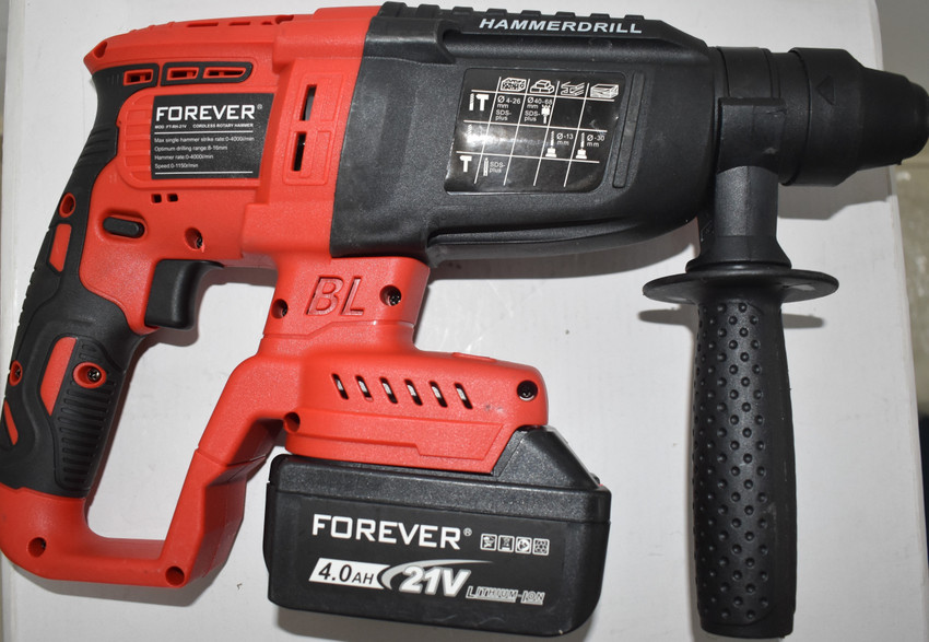 Battery operated hammer drill machine hotsell