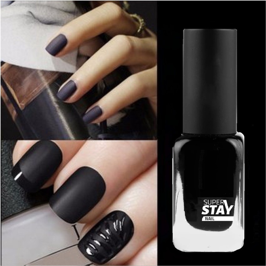 Chic matte black nails with a shiny heart | Instagram